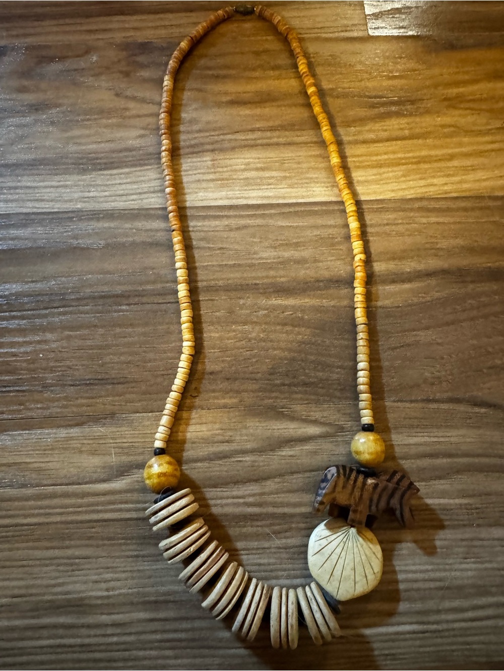 Vintage Tan and Cream Wooden Bead Necklace with Carved Animal Accent